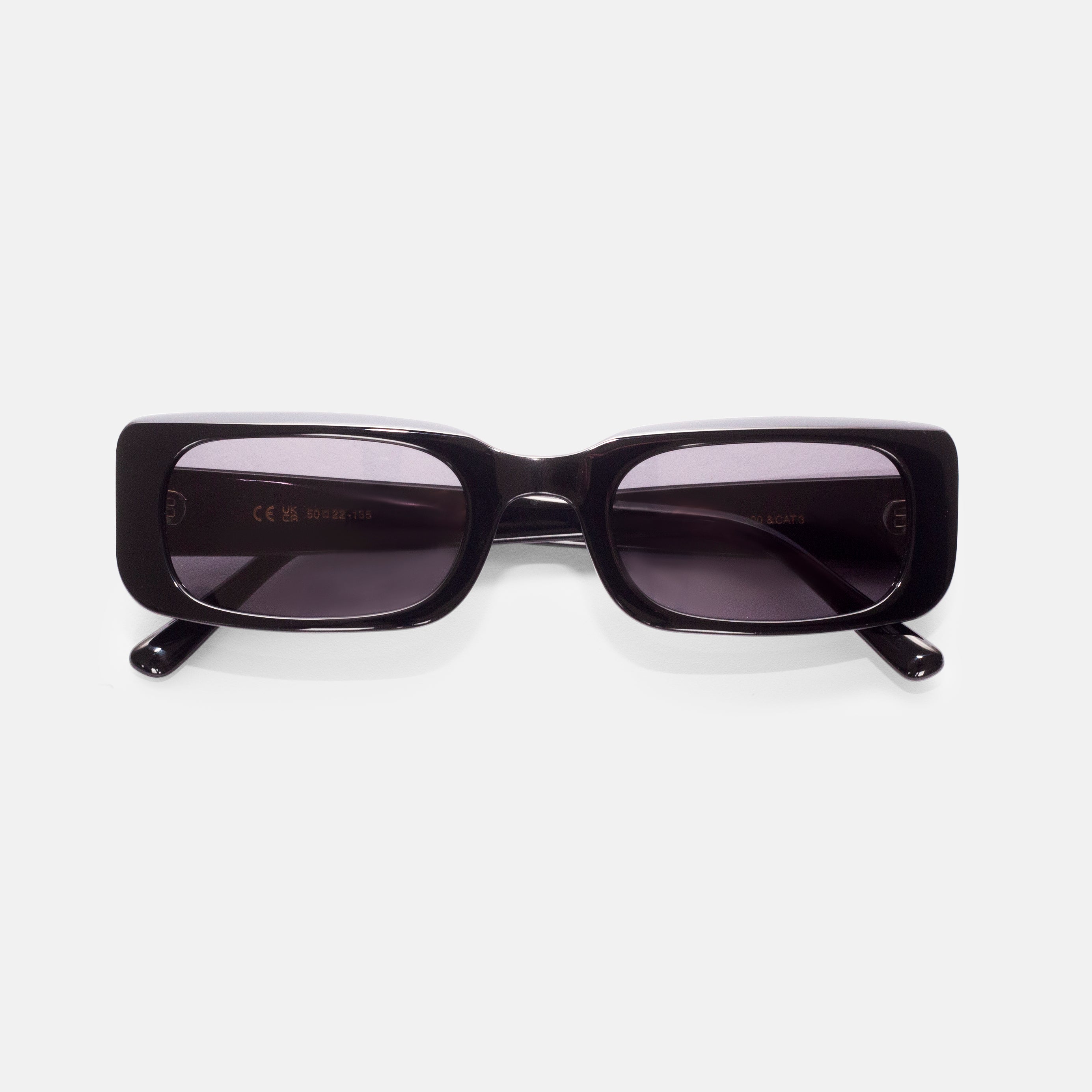 Front view of black rectangular sunglasses designed for smaller faces by Isla Sunwear.